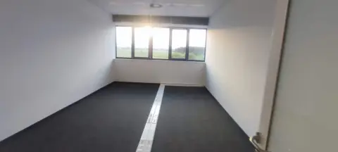 GLS — office space with carpet and windows