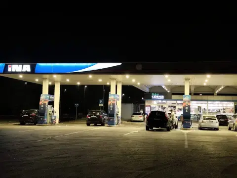 INA — exterior of an INA petrol station at night