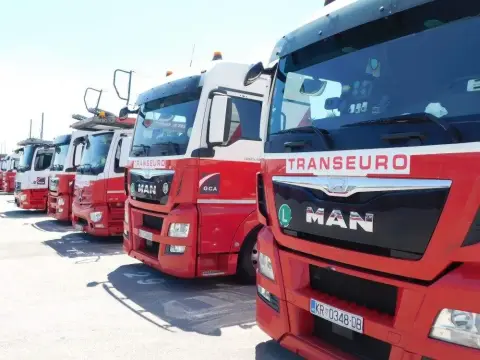 Transeuro Adria — parked fleet of red trucks